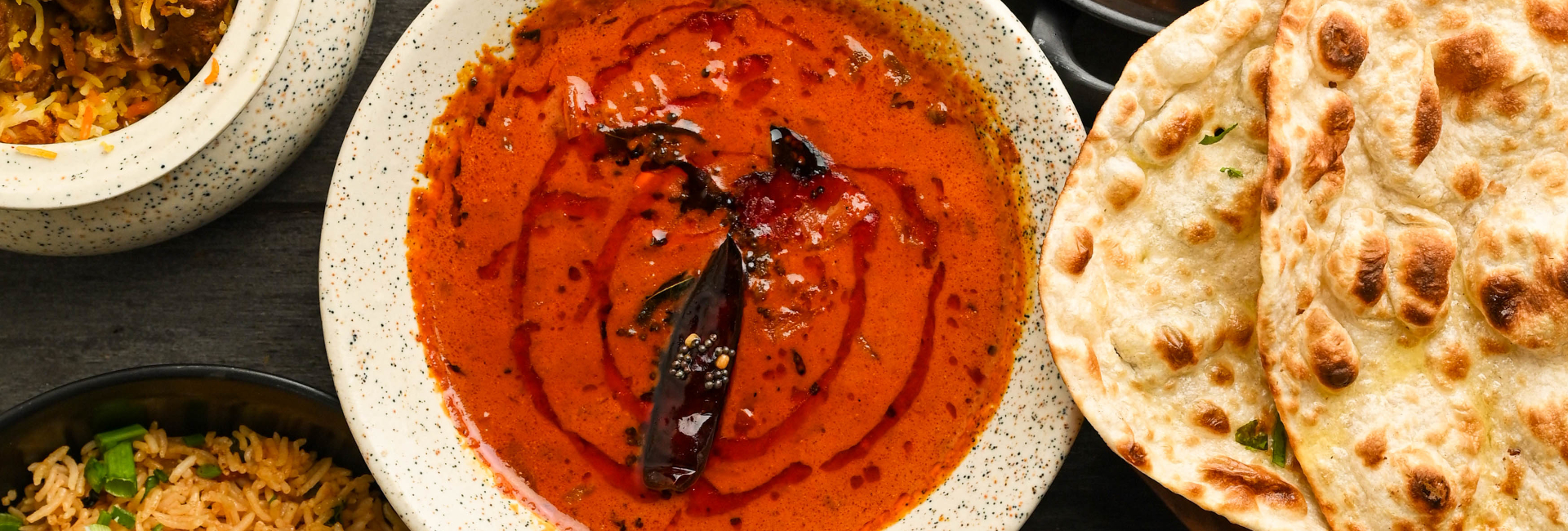 Indian curry with naan and rice at Food Exchange Aerocity Delhi