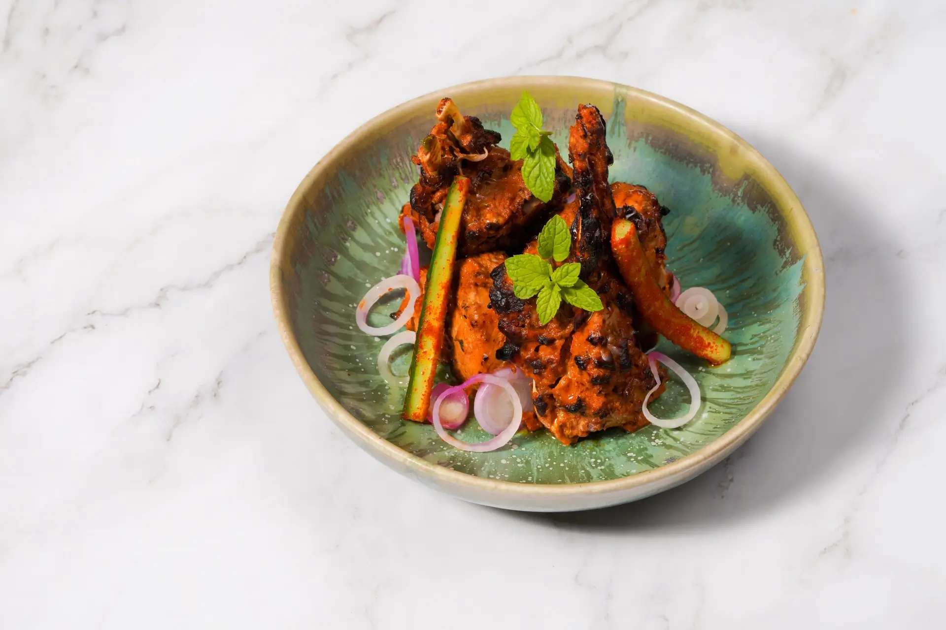 Grilled tandoori chicken with onions and mint at Food Exchange Aerocity Delhi
