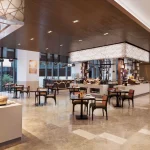 Food Exchange restaurant interior and buffet dining area at Novotel New Delhi Aerocity